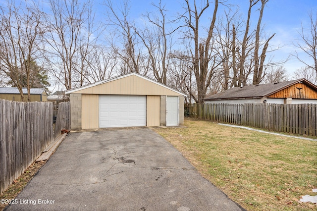 garage with a lawn