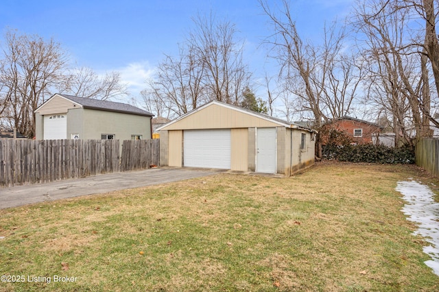 garage with a lawn