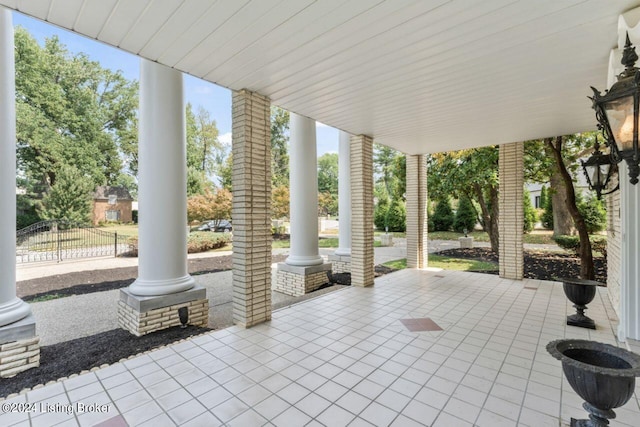 view of patio featuring fence