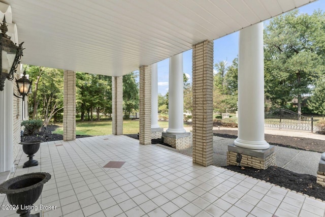 view of patio featuring fence