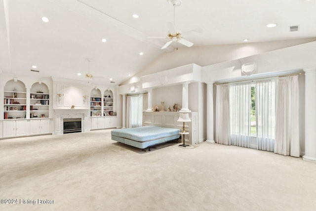 unfurnished bedroom featuring carpet, recessed lighting, visible vents, a premium fireplace, and vaulted ceiling