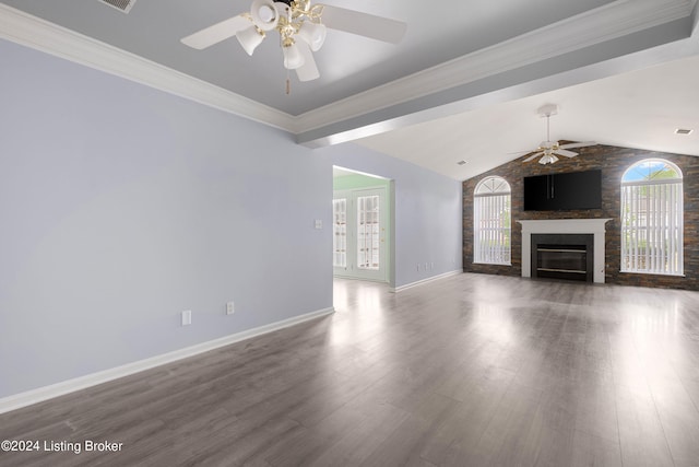 unfurnished living room with ceiling fan, ornamental molding, vaulted ceiling, and hardwood / wood-style flooring