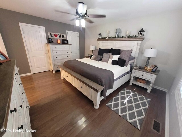 bedroom featuring ceiling fan and dark hardwood / wood-style floors