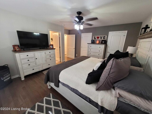 bedroom featuring dark hardwood / wood-style flooring and ceiling fan