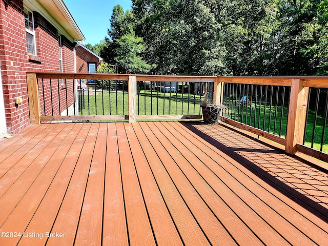 deck featuring a yard