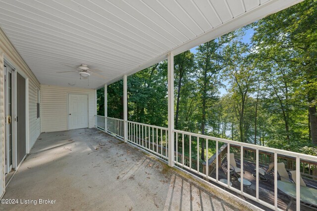 exterior space featuring ceiling fan