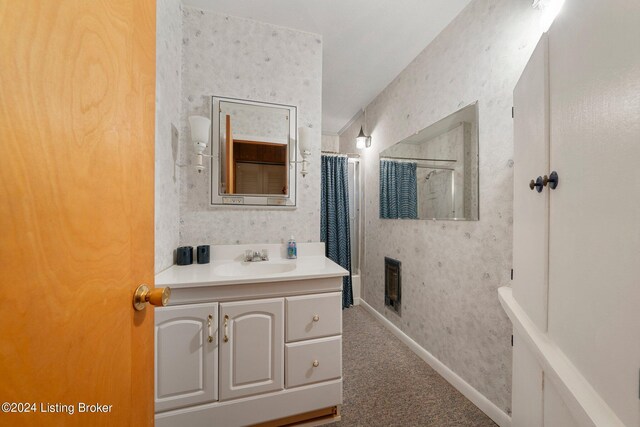 bathroom with vanity and a shower with shower curtain