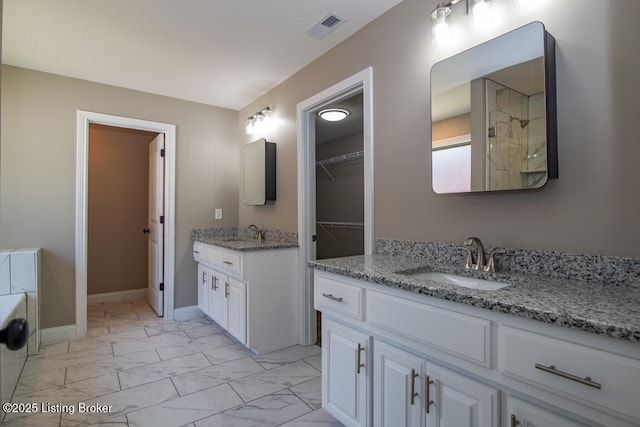 bathroom featuring vanity