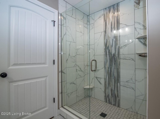 bathroom featuring an enclosed shower