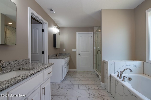 bathroom featuring vanity and plus walk in shower