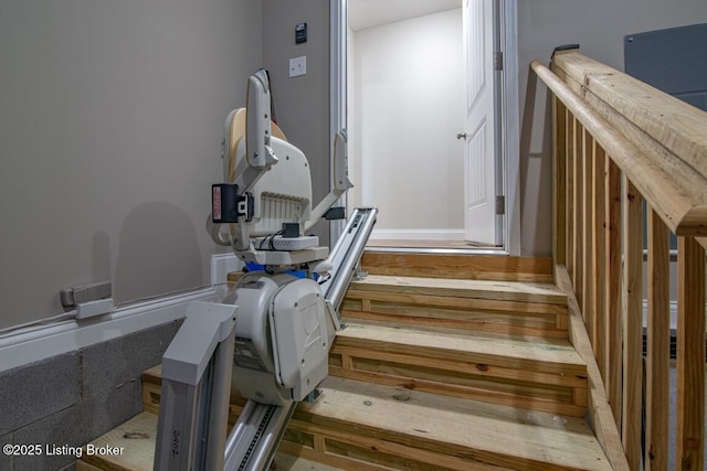 staircase featuring hardwood / wood-style flooring