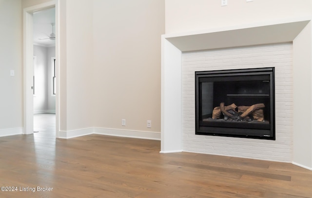 interior details featuring ceiling fan and hardwood / wood-style flooring