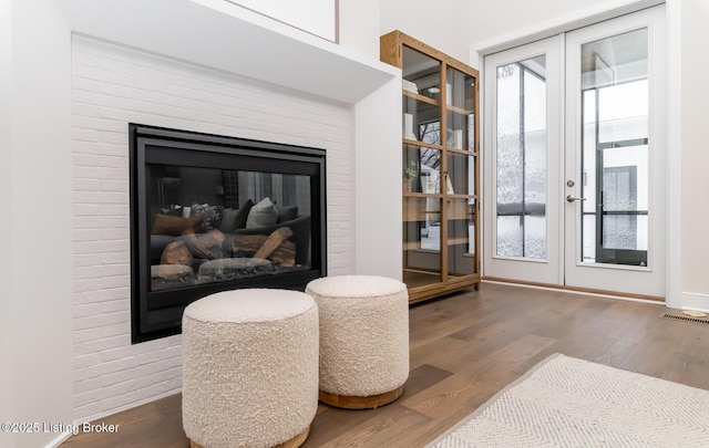 interior space with hardwood / wood-style flooring and french doors