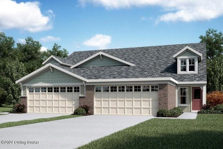 view of front facade with brick siding, concrete driveway, a garage, and a front yard