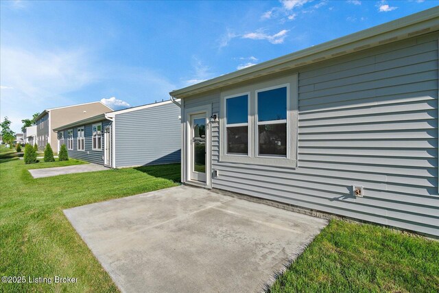 220 Harvest Moon Ct Unit 215B, Shepherdsville, KY 40165 - rear view of house featuring a patio and a yard