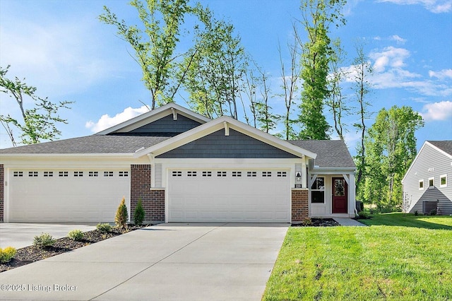 220 Harvest Moon Ct Unit 215B, Shepherdsville, KY 40165 - view of front of home featuring a front yard, driveway, brick siding, and a garage