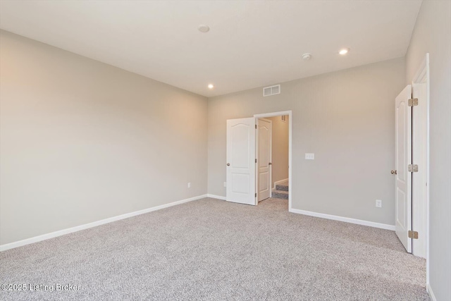 120 Exploration Path Unit 5B, Shelbyville, KY 40065 - unfurnished bedroom with light carpet, baseboards, and recessed lighting