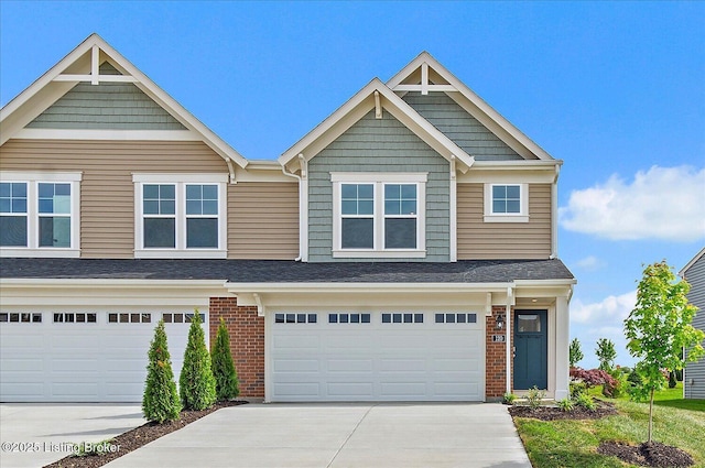 120 Exploration Path Unit 5B, Shelbyville, KY 40065 - view of front of home with concrete driveway, brick siding, and a garage