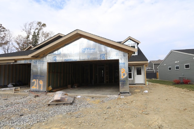 view of front of house with cooling unit