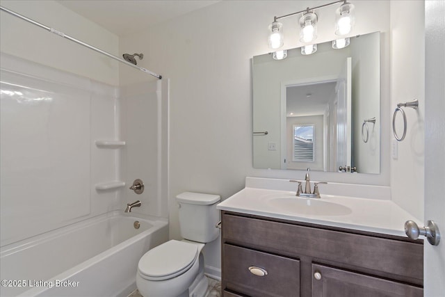 full bathroom with shower / bathing tub combination, vanity, and toilet