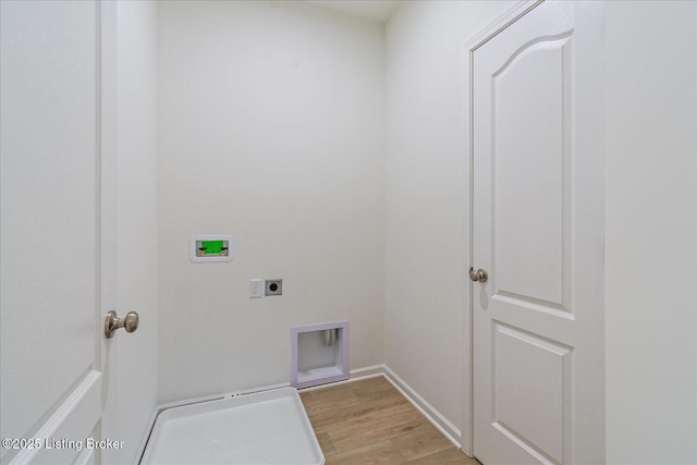 washroom featuring laundry area, light wood finished floors, hookup for a washing machine, and electric dryer hookup