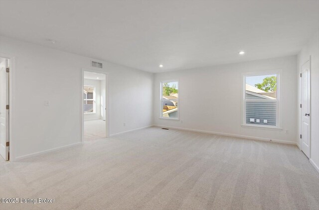 188 Harvest Moon Ct Unit 219B, Shepherdsville, KY 40165 - unfurnished room featuring healthy amount of natural light, light colored carpet, baseboards, and recessed lighting