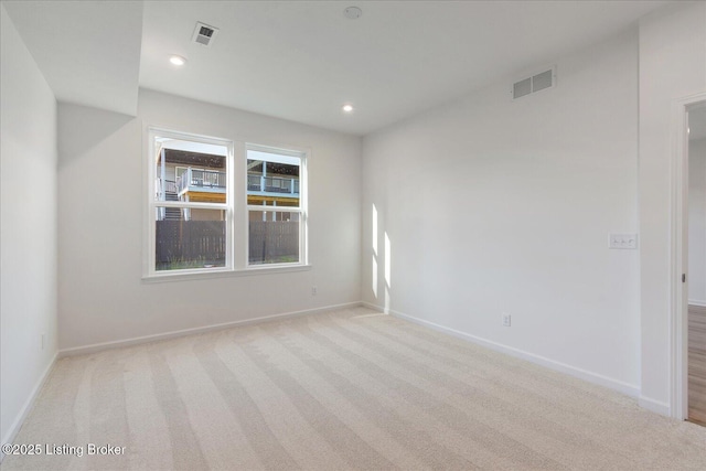 188 Harvest Moon Ct Unit 219B, Shepherdsville, KY 40165 - unfurnished room with light colored carpet, baseboards, and recessed lighting