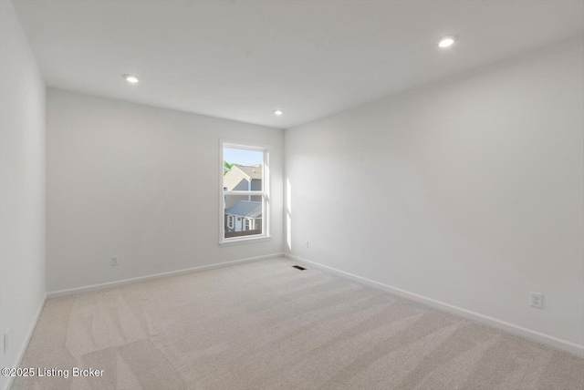 188 Harvest Moon Ct Unit 219B, Shepherdsville, KY 40165 - unfurnished room with carpet, baseboards, and recessed lighting
