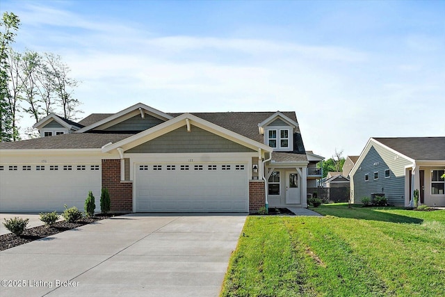 188 Harvest Moon Ct Unit 219B, Shepherdsville, KY 40165 - craftsman house featuring an attached garage, a front lawn, concrete driveway, brick siding, and roof with shingles