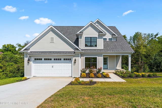 6712 Hypoint Ridge Rd, Crestwood, KY 40014 - view of front facade with roof with shingles, an attached garage, driveway, a front lawn, and covered porch