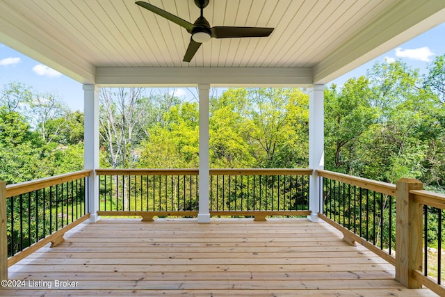 wooden terrace featuring ceiling fan