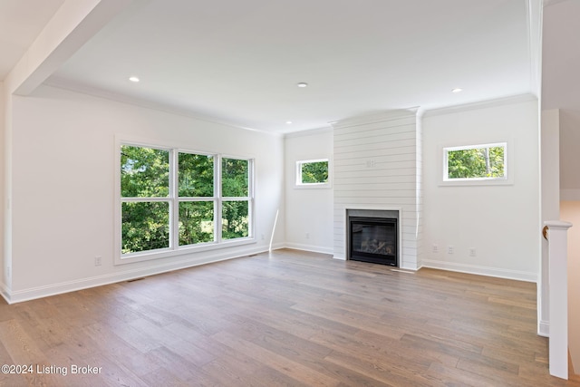 6715 Hypoint Ridge Rd, Crestwood, KY 40014 - unfurnished living room featuring crown molding, wood finished floors, and a large fireplace