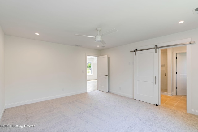 6715 Hypoint Ridge Rd, Crestwood, KY 40014 - unfurnished bedroom with recessed lighting, carpet flooring, baseboards, a barn door, and visible vents