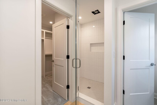 bathroom with walk in shower