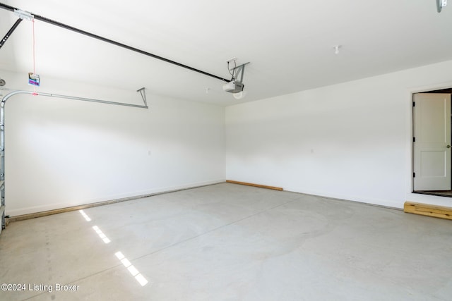 6715 Hypoint Ridge Rd, Crestwood, KY 40014 - garage featuring baseboards and a garage door opener
