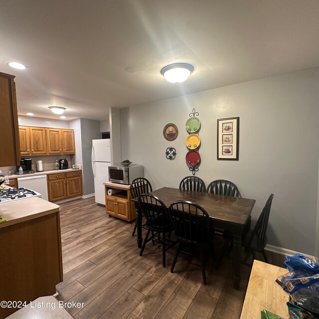 dining room featuring wood-type flooring