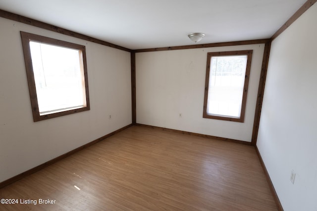 empty room featuring light hardwood / wood-style floors