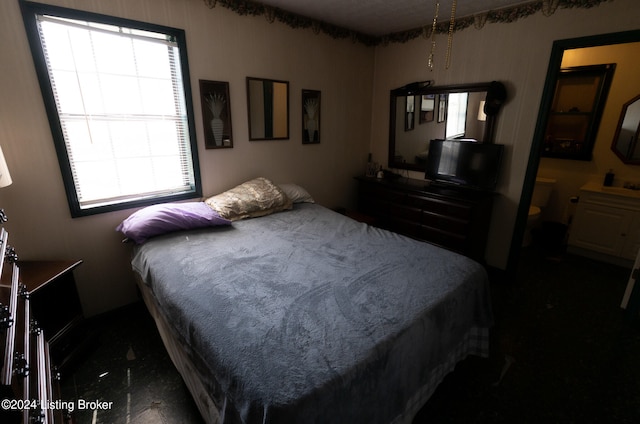 bedroom featuring multiple windows