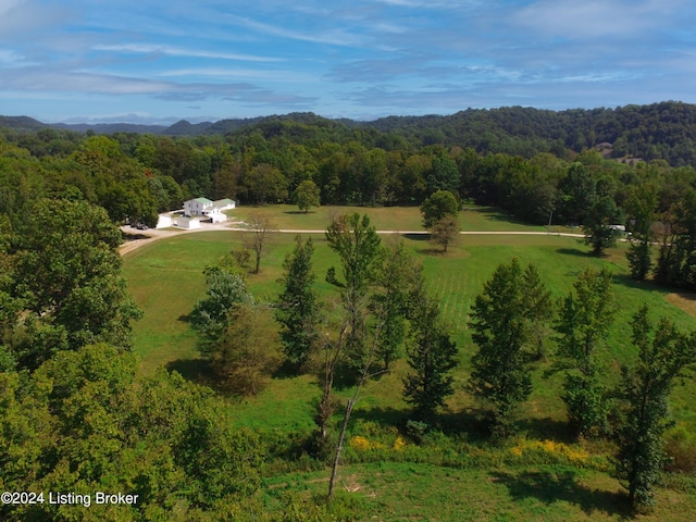 birds eye view of property featuring a rural view