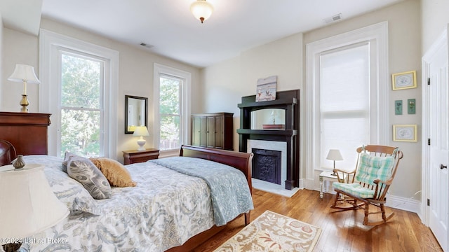 bedroom with light wood-type flooring