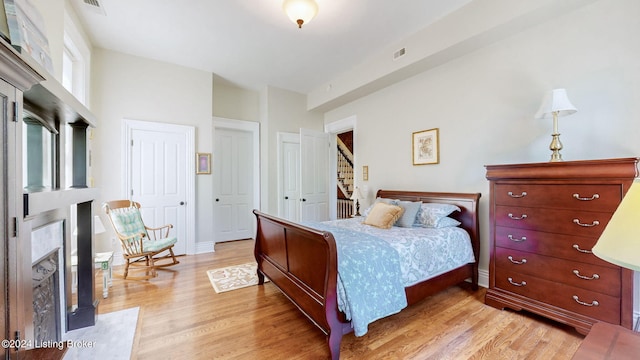 bedroom featuring light hardwood / wood-style floors