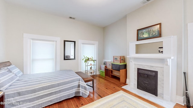 bedroom with hardwood / wood-style flooring