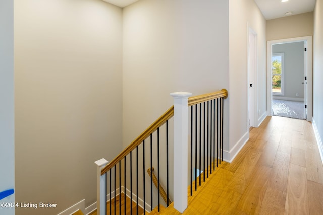 corridor featuring light hardwood / wood-style flooring