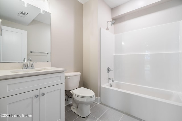 full bathroom featuring toilet, shower / washtub combination, vanity, and tile patterned flooring