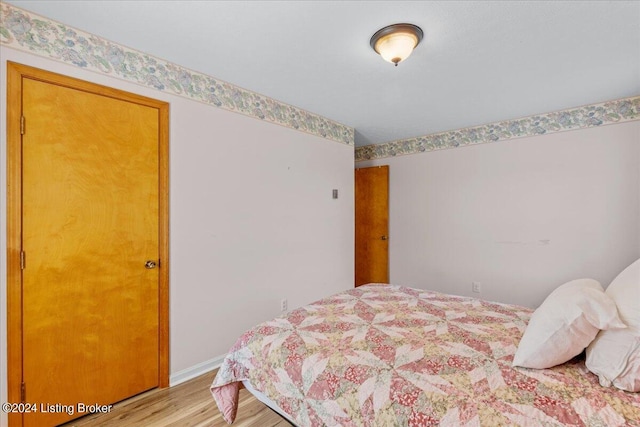 bedroom with light hardwood / wood-style floors