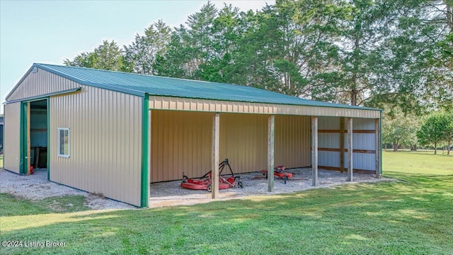 view of outdoor structure with a lawn