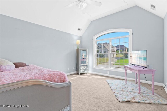 bedroom with carpet flooring, ceiling fan, and vaulted ceiling