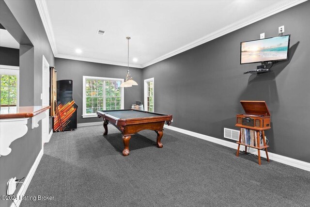 rec room featuring pool table, ornamental molding, and dark colored carpet