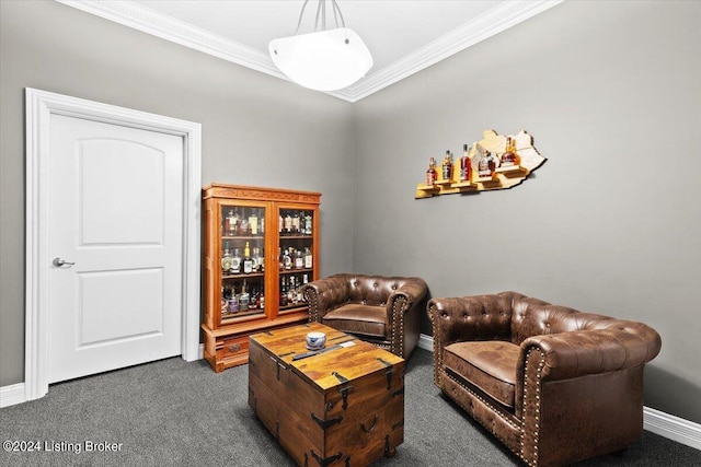 living area featuring baseboards, dark colored carpet, and ornamental molding