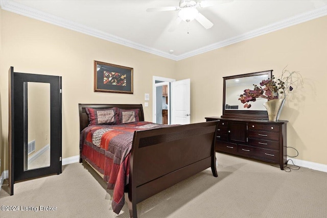 bedroom featuring light colored carpet, crown molding, baseboards, and ceiling fan